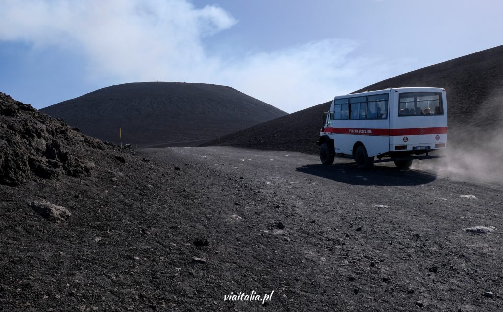 Off-road vehicle with tourists on the way to Etna